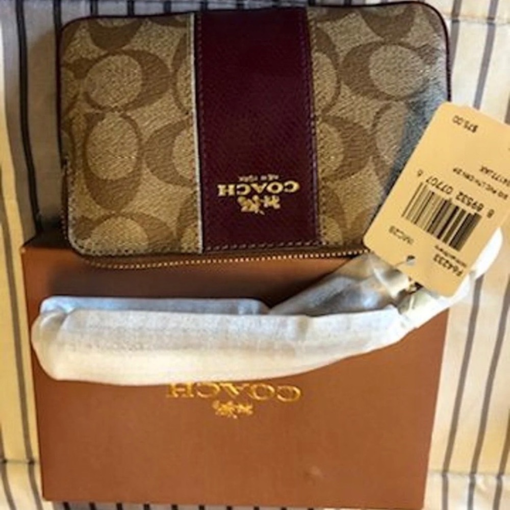 Coach signature wristlet